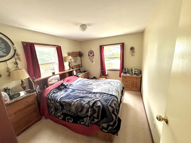 3 Rush Blvd, Millinocket, ME 04462 - bedroom featuring light colored carpet and multiple windows
