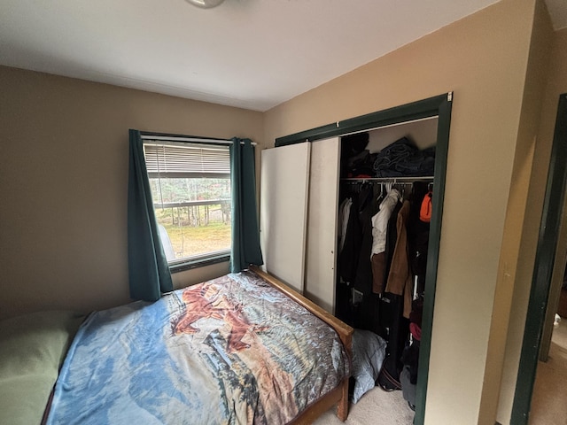 3 Rush Blvd, Millinocket, ME 04462 - bedroom featuring a closet and light carpet