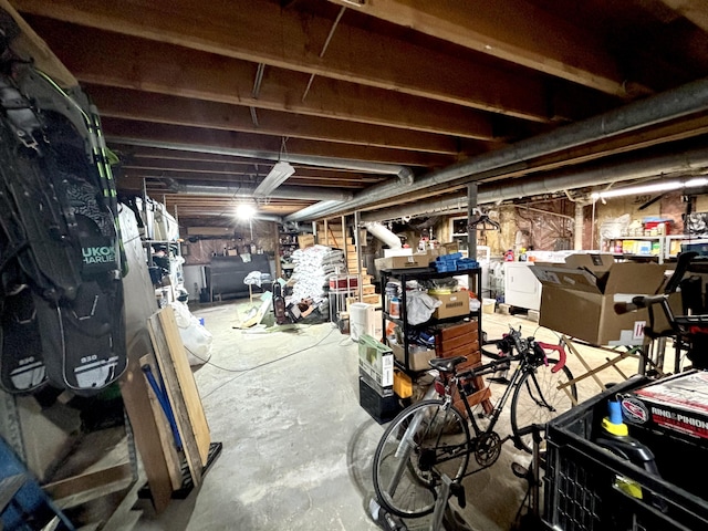 3 Rush Blvd, Millinocket, ME 04462 - unfinished below grade area featuring washer and clothes dryer