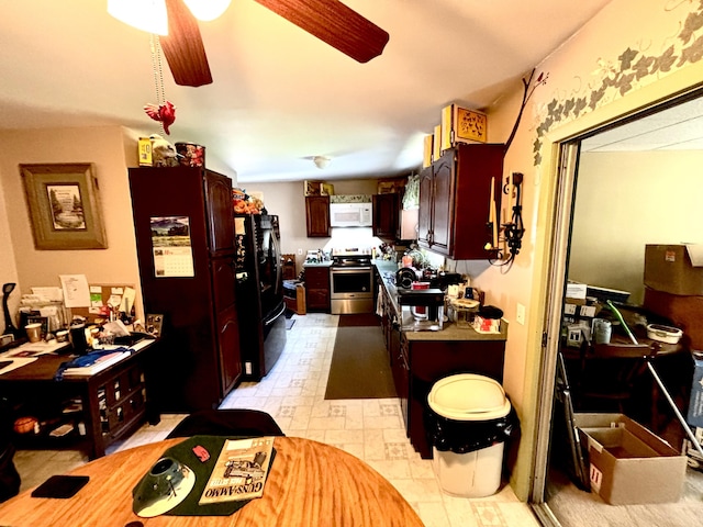 3 Rush Blvd, Millinocket, ME 04462 - kitchen featuring stainless steel electric stove, white microwave, freestanding refrigerator, a ceiling fan, and light countertops