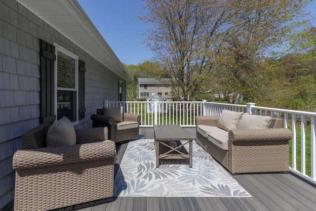 wooden deck featuring an outdoor hangout area