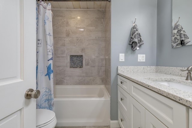 full bathroom featuring shower / bath combo with shower curtain, toilet, and vanity
