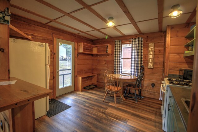 285 Quimby Pond Rd, Rangeley, ME 04970 - dining area featuring wood finished floors and wood walls
