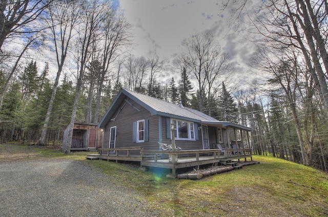 285 Quimby Pond Rd, Rangeley, ME 04970 - chalet / cabin with metal roof and a front yard
