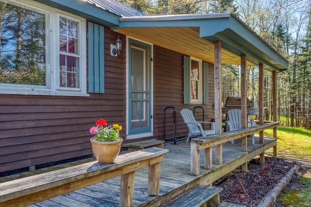 285 Quimby Pond Rd, Rangeley, ME 04970 - wooden terrace featuring a grill and a porch