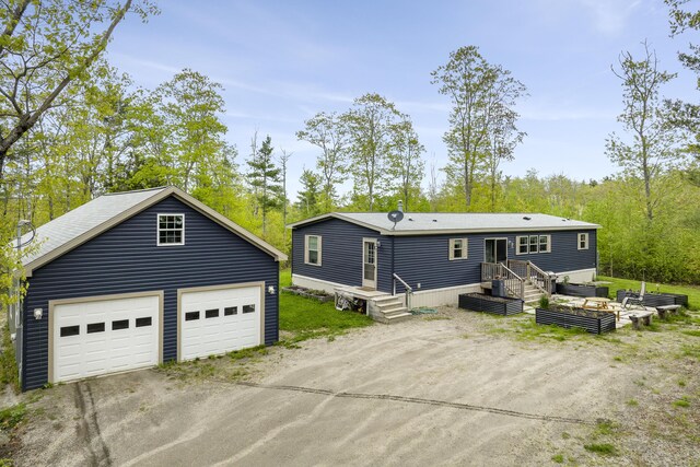70 Lions Ridge Dr, Alna, ME 04535 - back of house featuring an outdoor structure and a garage