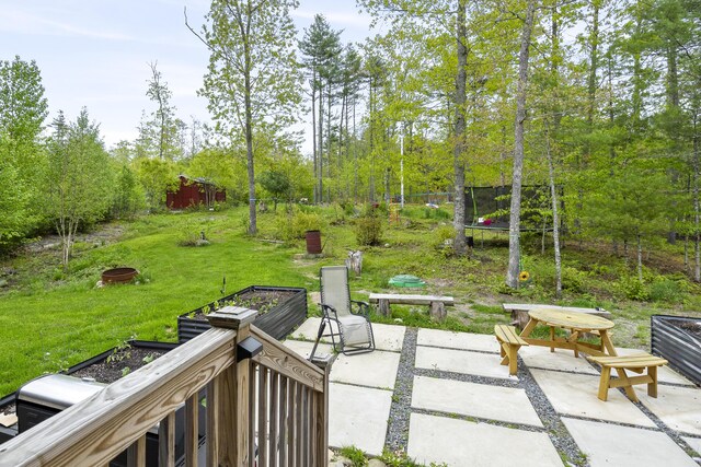 70 Lions Ridge Dr, Alna, ME 04535 - view of patio / terrace with a trampoline