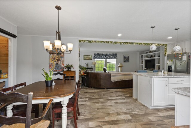 70 Lions Ridge Dr, Alna, ME 04535 - kitchen with stainless steel refrigerator with ice dispenser, white cabinets, a chandelier, light stone counters, and crown molding