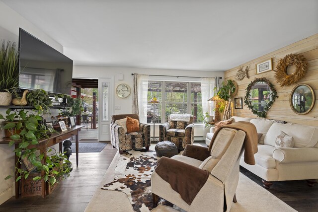 70 Lions Ridge Dr, Alna, ME 04535 - living room with hardwood / wood-style floors, a baseboard heating unit, and wooden walls