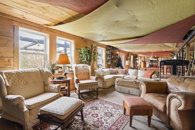 70 Lions Ridge Dr, Alna, ME 04535 - carpeted living room featuring wooden walls