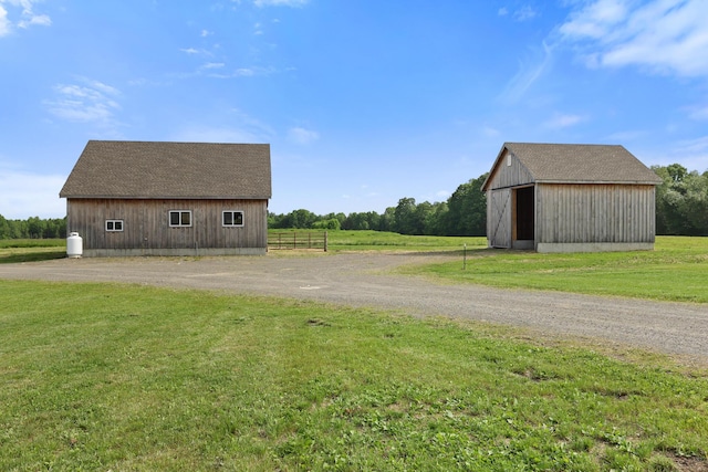 585 Charleston Rd, Charleston, ME 04422 - view of barn with a view of rural / pastoral area and dirt driveway