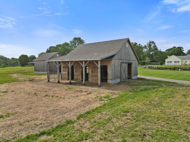 585 Charleston Rd, Charleston, ME 04422 - view of outbuilding featuring an exterior structure