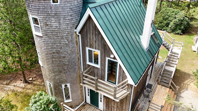 832 Main Rd, Islesboro, ME 04848 - view of side of home with a standing seam roof and metal roof