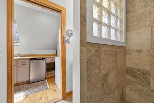 832 Main Rd, Islesboro, ME 04848 - bathroom featuring plenty of natural light, wood finished floors, and vanity