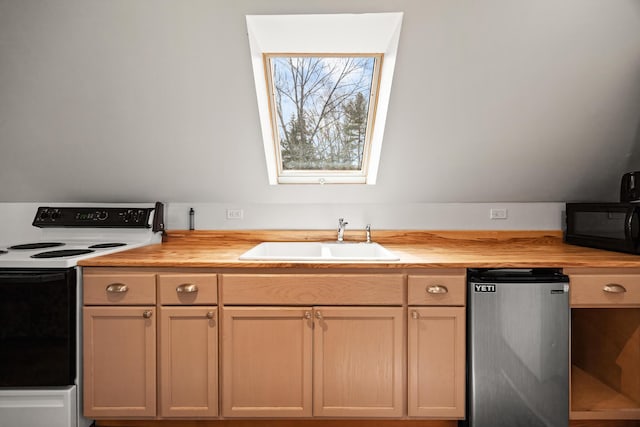 832 Main Rd, Islesboro, ME 04848 - kitchen with butcher block countertops, a sink, electric stove, stainless steel refrigerator, and black microwave