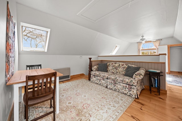 832 Main Rd, Islesboro, ME 04848 - living room featuring a ceiling fan, wood finished floors, and vaulted ceiling