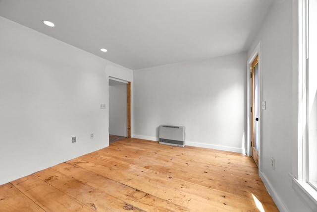 832 Main Rd, Islesboro, ME 04848 - unfurnished room featuring heating unit, light wood finished floors, and recessed lighting