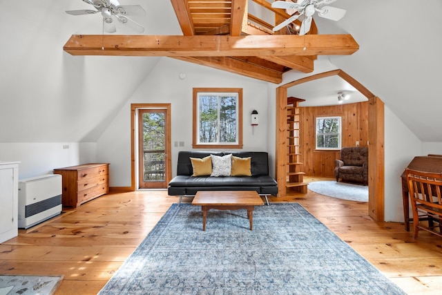 832 Main Rd, Islesboro, ME 04848 - sitting room with a ceiling fan, hardwood / wood-style flooring, heating unit, and wood walls