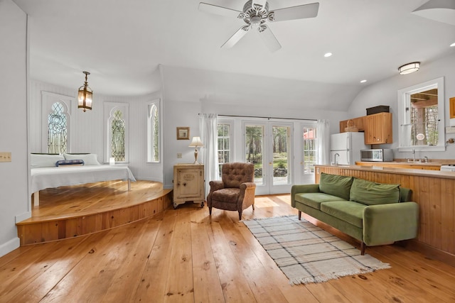 832 Main Rd, Islesboro, ME 04848 - living room with light wood-style flooring, french doors, ceiling fan, recessed lighting, and vaulted ceiling