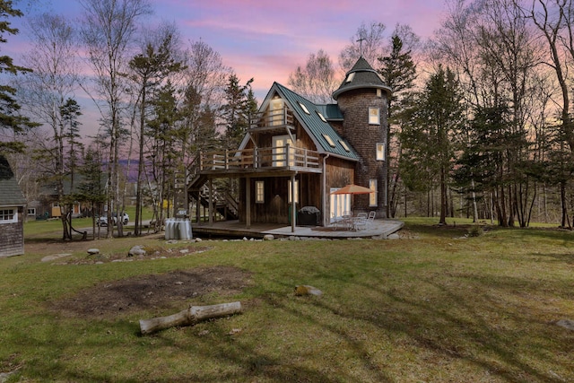 832 Main Rd, Islesboro, ME 04848 - rear view of property featuring a standing seam roof, a deck, a yard, and stairs