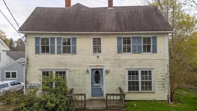 41 Church St, Damariscotta, ME 04543 - colonial-style house featuring a chimney, a shingled roof, and a wooden deck