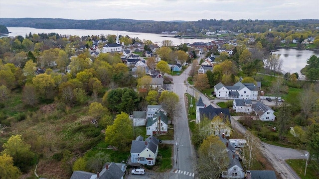 41 Church St, Damariscotta, ME 04543 - aerial view of property and surrounding area with a nearby body of water, nearby suburban area, and a heavily wooded area