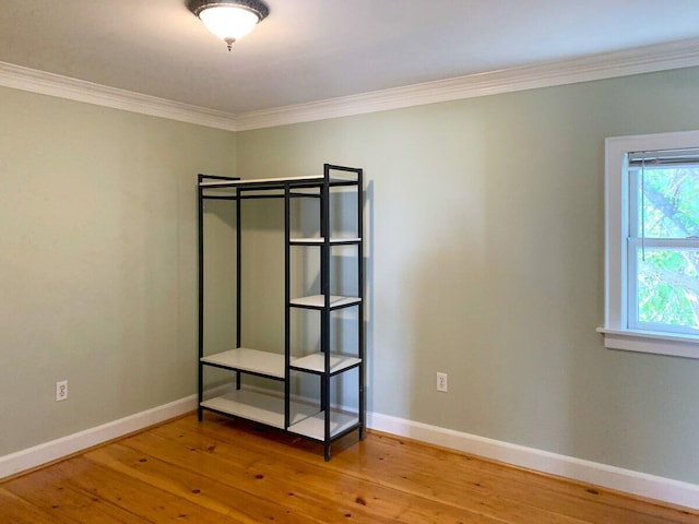 41 Church St, Damariscotta, ME 04543 - unfurnished room with crown molding, wood finished floors, and baseboards