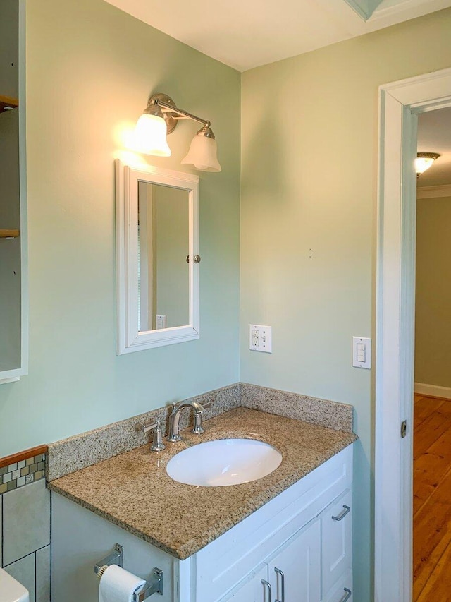 41 Church St, Damariscotta, ME 04543 - bathroom with vanity and wood finished floors