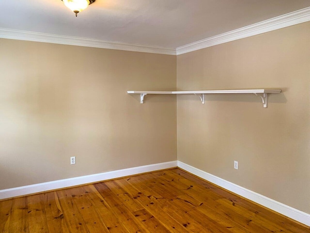 41 Church St, Damariscotta, ME 04543 - empty room featuring baseboards, ornamental molding, and hardwood / wood-style flooring