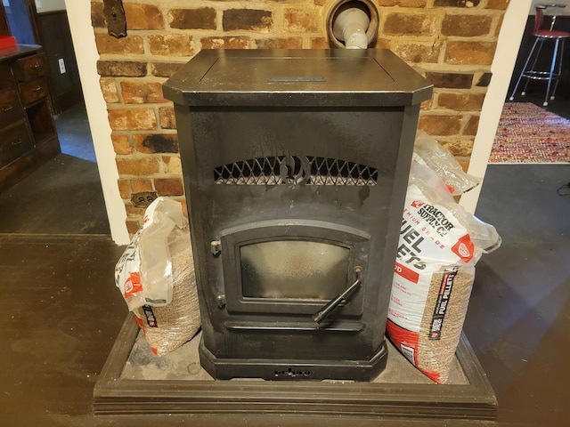 detailed view of a wood stove and brick wall