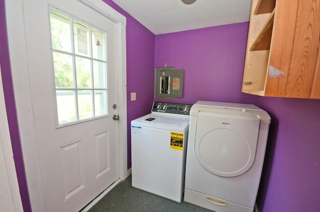 26 Flat Iron Rd, Tremont, ME 04653 - laundry area featuring washing machine and dryer, electric panel, and cabinet space