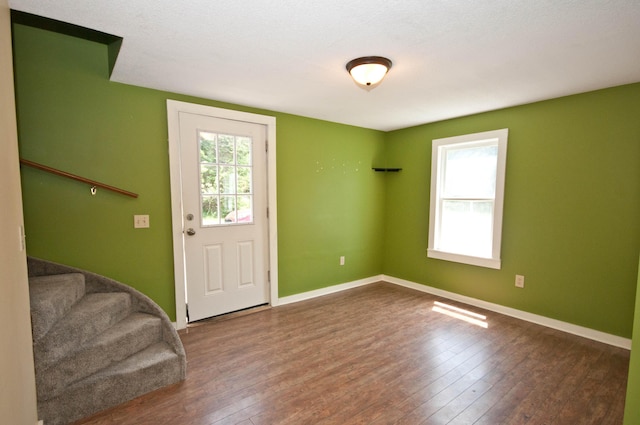 26 Flat Iron Rd, Tremont, ME 04653 - entryway featuring healthy amount of natural light, wood-type flooring, and stairway