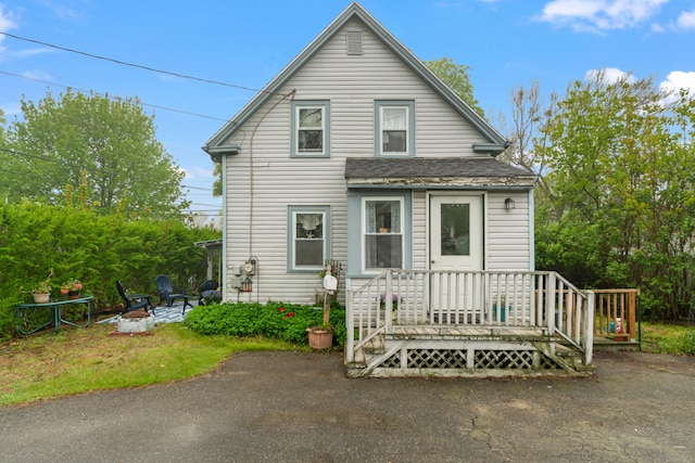 4 Otis St, Rockland, ME 04841 - view of front of home featuring roof with shingles and a patio area