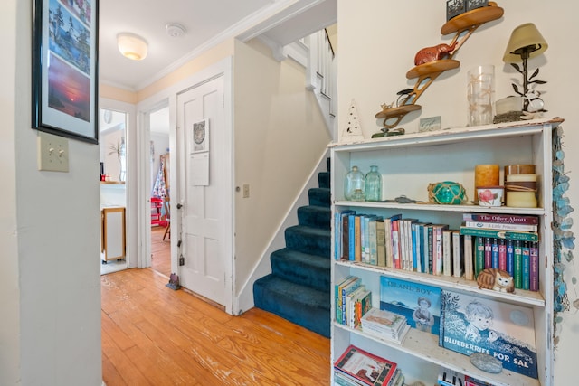 4 Otis St, Rockland, ME 04841 - foyer entrance featuring ornamental molding, wood finished floors, and stairs