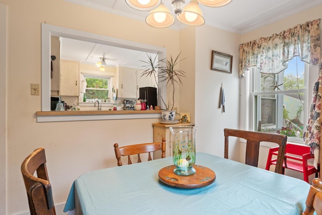 4 Otis St, Rockland, ME 04841 - dining room featuring a chandelier and ornamental molding