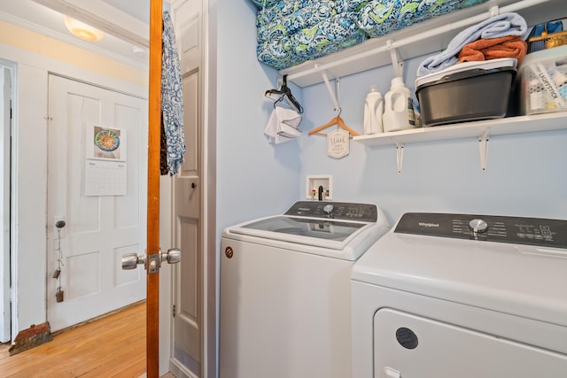 4 Otis St, Rockland, ME 04841 - washroom featuring washer and clothes dryer and light wood finished floors