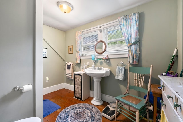 4 Otis St, Rockland, ME 04841 - bathroom with baseboards and wood-type flooring
