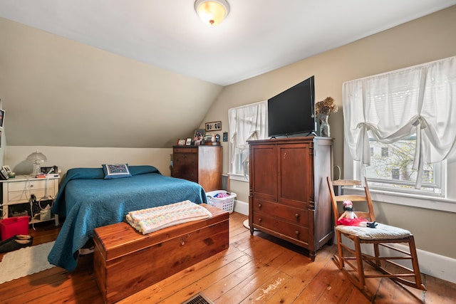 4 Otis St, Rockland, ME 04841 - bedroom featuring hardwood / wood-style floors, vaulted ceiling, and baseboards