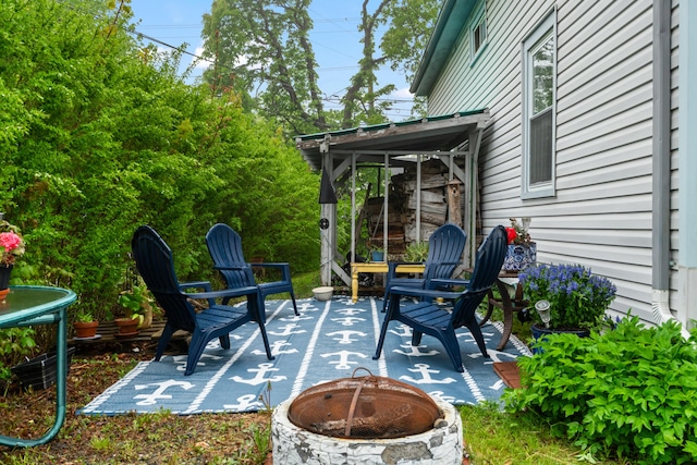 4 Otis St, Rockland, ME 04841 - view of patio / terrace featuring an outdoor fire pit