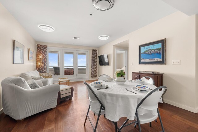 31 Ocean Ave Unit 309, York, ME 03909 - dining space featuring dark wood-style flooring and baseboards
