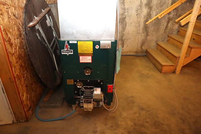 utility room with heating unit