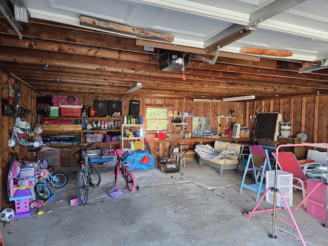 36 Lorraine Ave, Brewer, ME 04412 - garage featuring a workshop area and a garage door opener