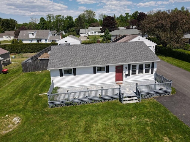 36 Lorraine Ave, Brewer, ME 04412 - view of front of home with a shingled roof, a front yard, and a residential view