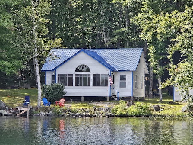 20 Lily Bay Ln, Parsonsfield, ME 04047 - rear view of house featuring a water view, metal roof, and entry steps