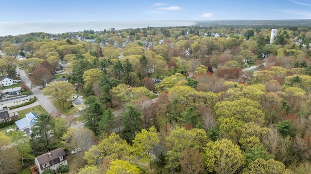aerial overview of property's location featuring a heavily wooded area