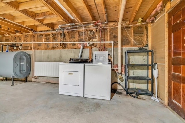 unfinished basement with heating fuel and washing machine and dryer
