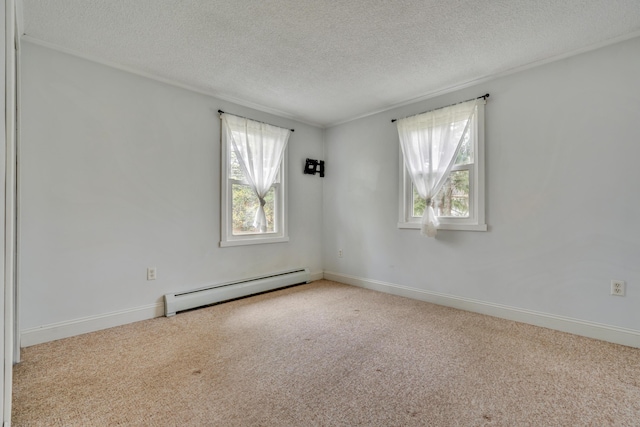 carpeted spare room featuring a baseboard radiator, a textured ceiling, and baseboards
