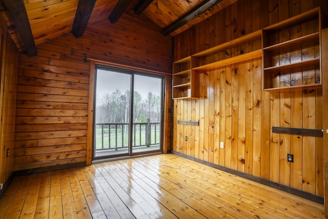 526 Range Rd, Dover-Foxcroft, ME 04426 - empty room with wood walls, hardwood / wood-style floors, and wooden ceiling