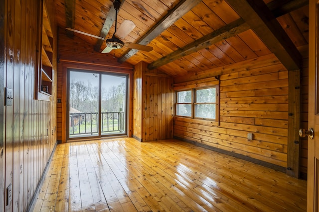 526 Range Rd, Dover-Foxcroft, ME 04426 - empty room featuring wooden ceiling, wood-type flooring, wood walls, and ceiling fan