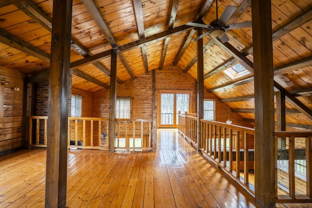 526 Range Rd, Dover-Foxcroft, ME 04426 - corridor featuring wooden ceiling, hardwood / wood-style flooring, a skylight, and wooden walls